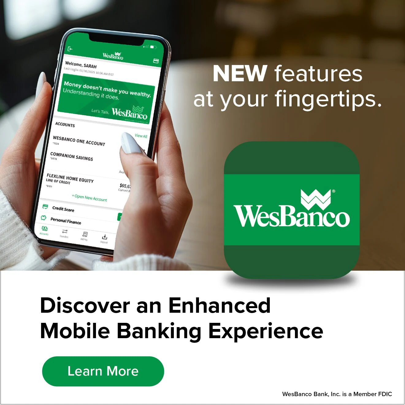 Person holding a mobile phone looking at the wesbanco mobile banking app text reads new features at your fingertips and discover an enhanced mobile banking experience